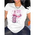 thumbnail image 1 of Camiseta negra festiva para mujer con lazo rosa y estampado de champán y fuegos artificiales. Cuello redondo y manga corta. Cómoda mezcla de algodón. Ideal para celebraciones de Año Nuevo. Camiseta de, 1 of 8