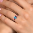 thumbnail image 4 of Gem Stone King 925 Sterling Silver Swiss Blue Topaz and Red Created Ruby Engagement Ring for Women | 1.50 Cttw | Oval 7X5MM | Gemstone November Birthstone | Size 5, 4 of 6