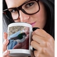 thumbnail image 2 of 3drose, a Man Holding an Injured Green, White and Gray Bird on His Finger in Pine Valley, Utah, 15oz Two-tone Black Mug, 2 of 6