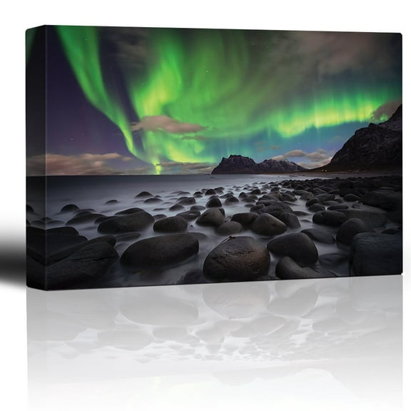 wall26 - Green Northern Lights Over an Ocean Filled with Rocks - Canvas Art Home Art - 12x18 inches