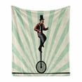 thumbnail image 1 of Retro Soft Flannel Fleece Throw Blanket, Vintage Inspired Circus Man on Monowheel Bike with Sun Rays, Cozy Plush for Indoor and Outdoor Use, 70" x 90", Eggshell Pale Green, by Ambesonne, 1 of 5