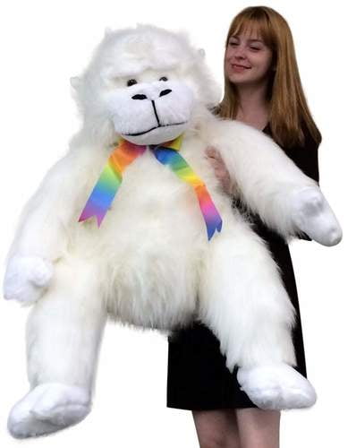 white fluffy stuffed dog
