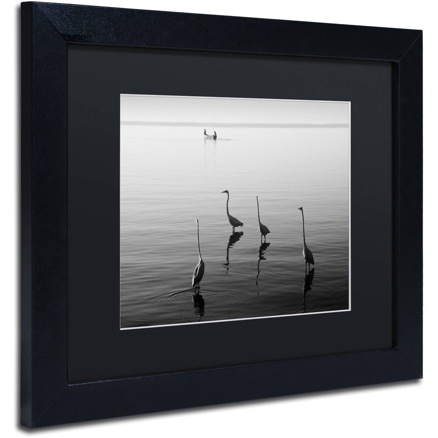 Trademark Fine Art "4 Herons and Boat" Canvas Art by Moises Levy Black Matte, Black Frame