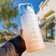 thumbnail image 1 of Botella de agua deportiva de 2000 ml Botellas de viaje portátiles con pajita con escala de tiempo (azul) Ehuebsd Libre de BPA, 1 of 7