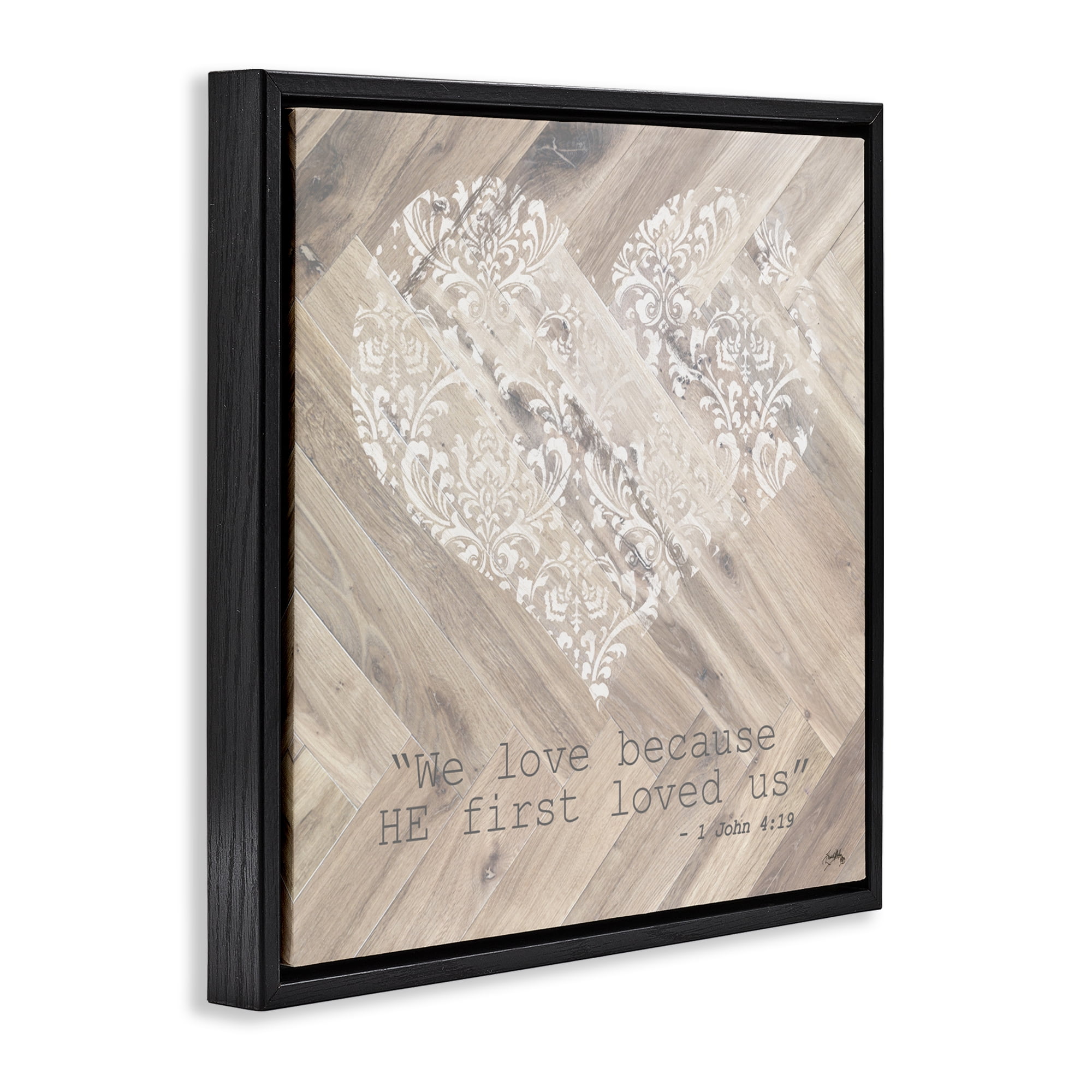Stupell Industries He Loved Us First Black Framed Floater Canvas Wall Art, design by Elizabeth Medley