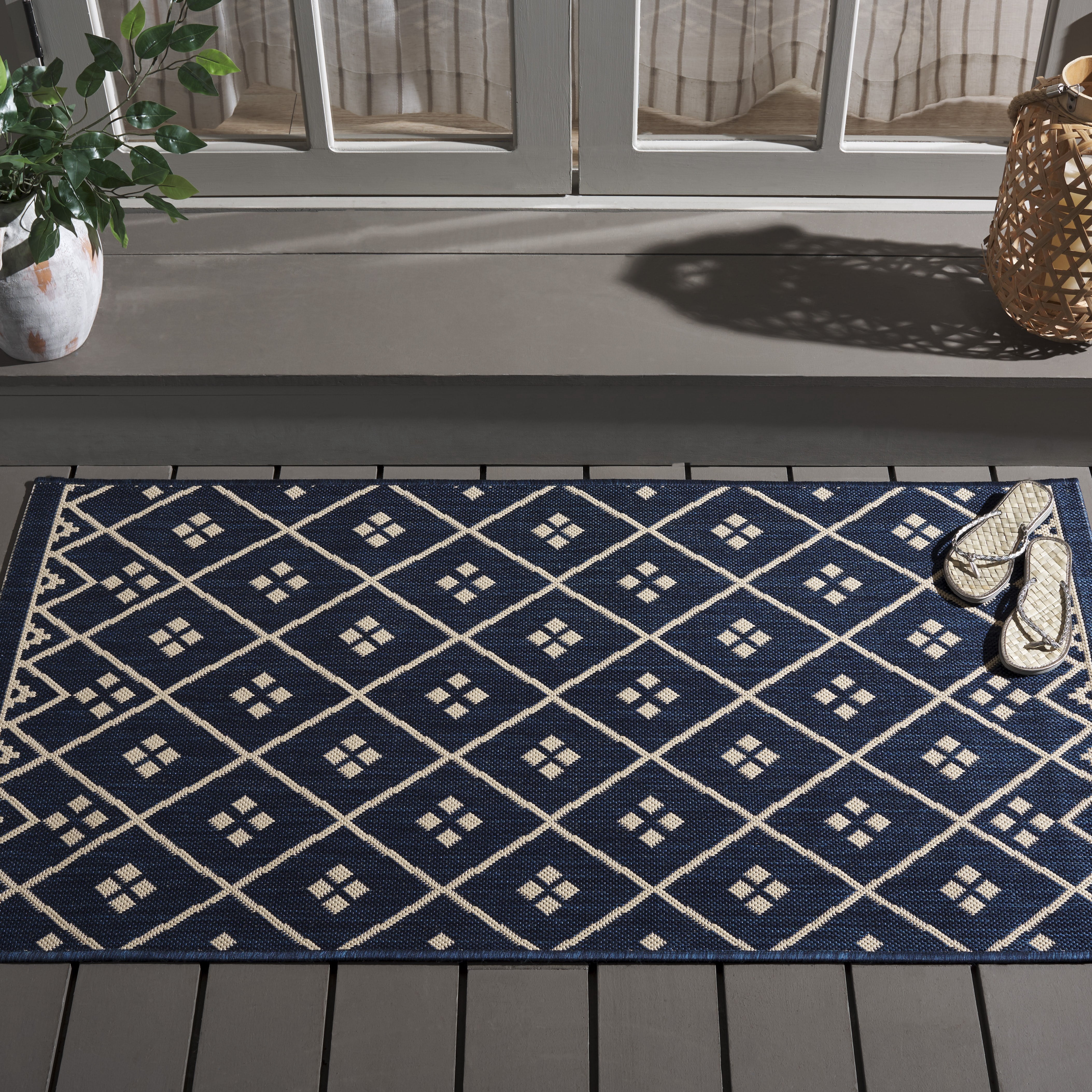 Safavieh Courtyard Cori Bordered Indoor/Outdoor Area Rug, Navy/Light Beige, 4' x 5'7"