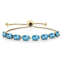 Gem Stone King 18K Yellow Gold Plated Silver Swiss Blue Topaz Tennis Bracelet for Women (8.00 Cttw, Gemstone November Birthstone, Oval 7X5MM, Fully Adjustable up to 9 inch)