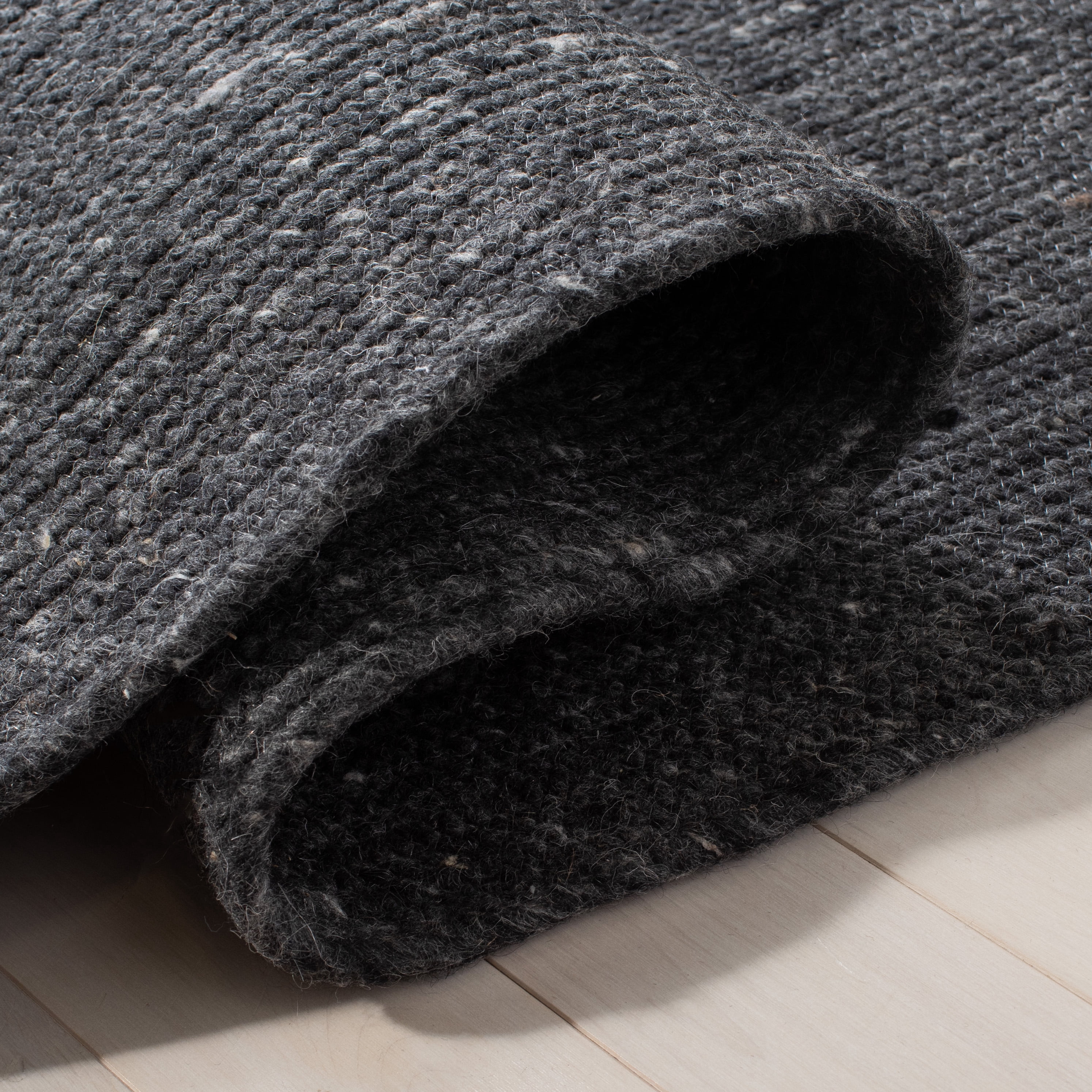 SAFAVIEH Braided Ronan Solid Reversible Area Rug, Black, 5' x 7' Oval