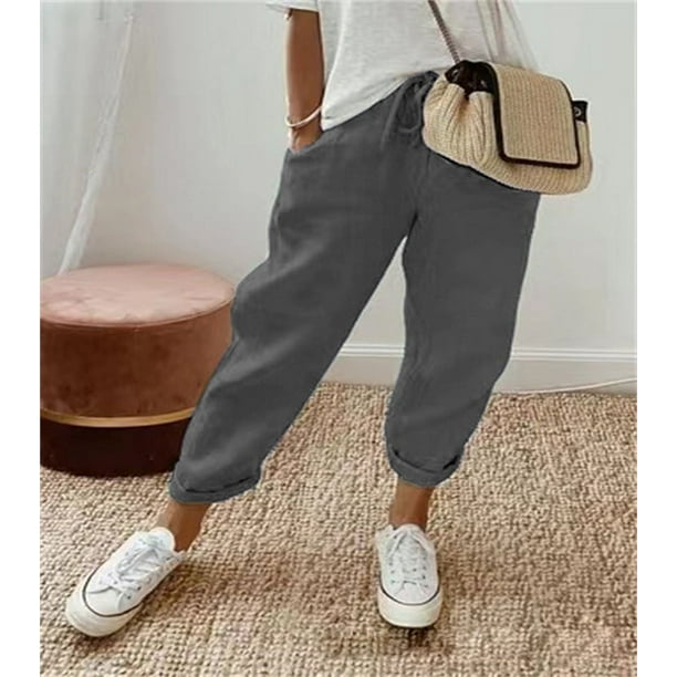 Pantalones casuales elásticos con bolsillos de algodón y lino para mujer de Europa y América.