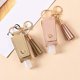 thumbnail image 2 of Portable Plastic Travel Bottle with Leather Hand Sanitizer Keychain Holder with Tassel Holster (Pink), 2 of 3