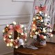 thumbnail image 4 of Paquete de árbol de Navidad gris de 45/60/90 cm, corona de flocado para colgar en la puerta, decoración de ambiente de escena de centro comercial de hotel, 4 of 5
