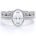 thumbnail image 1 of JeenMata Impresionante Anillo de Bodas de Tres Piezas de Moissanita de Corte Ovalado de 1,5 Quilates Engastado en Oro Blanco de 18 K sobre Plata, 1 of 6