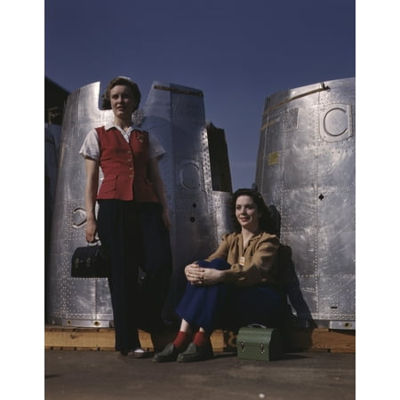 1942 Aircraft - Two female assembly line workers enjoy a lunch break at Douglas Aircraft Company 1942 Poster Print by Stocktrek Images