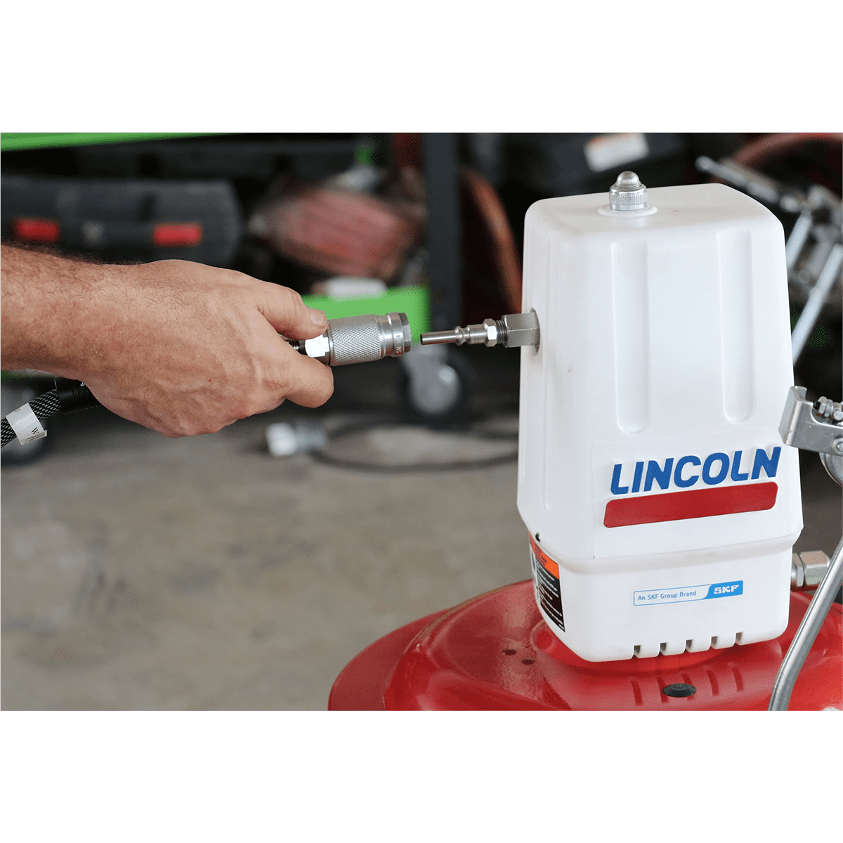 Lincoln 917 Pneumatic 50:1 Ratio Double Acting Grease Pump with Roll-Around Base