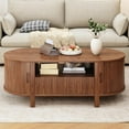 thumbnail image 3 of ONBRILL 47.2 Inch Oval Coffee Table with Storage, Mid Century Modern Coffee Table with Drawer, Center Table with Sliding Door and Wood Fluted Handle for Living Room, Walnut, 3 of 7
