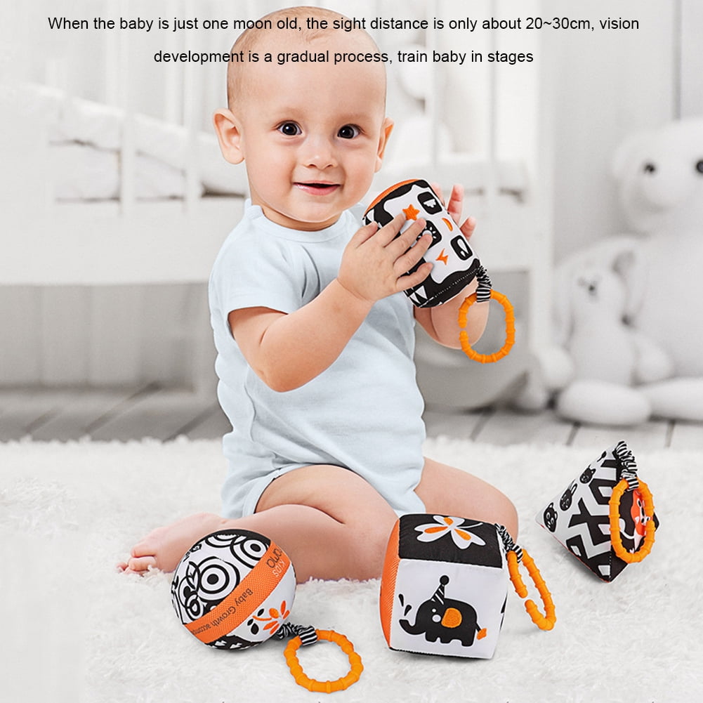 black and white hanging baby toys