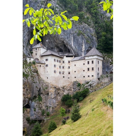 South Cave Castle Christmas Predjama, Inner Carniola, Slovenia. Predjama Castle, built into the opening of a cave. Print Wall Art ()