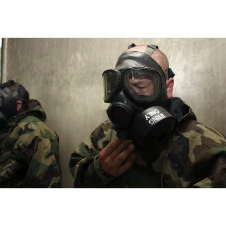 Radio Japan Camp Hansen Okinawa Japan April 21 2006 - A field radio operator clears CS gas from his gas mask at the gas chamber Poster Print ()