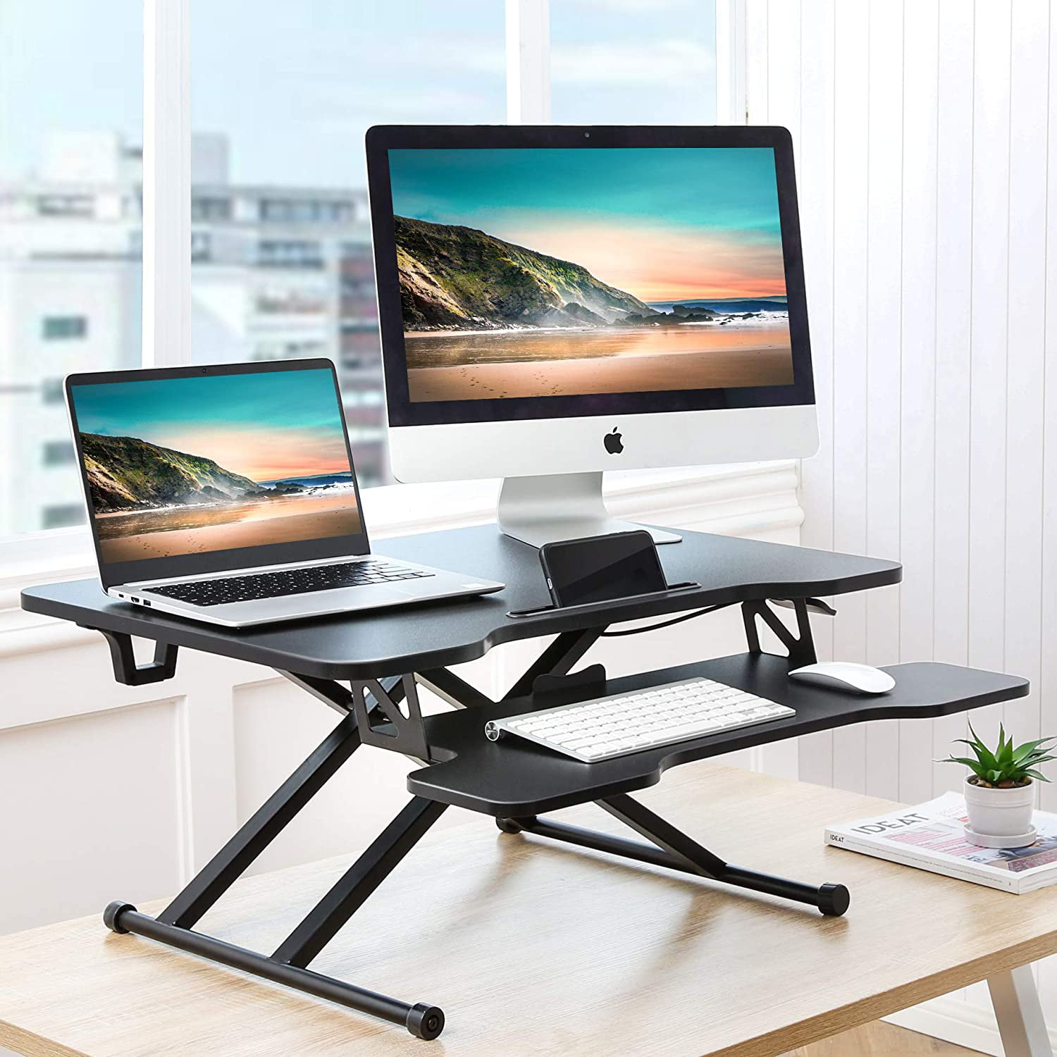FITUEYES Standing Desk Converter Sit to Stand Up Desk Tabletop Workstation 31 Inch Wide Platform with Keyboard Tray SD108002MB 