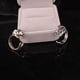 thumbnail image 2 of Ring med hund som kramar fingret tax svart guld silver, 2 of 2