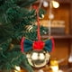 thumbnail image 4 of Adornos navideños con campanas de terciopelo rojo y lazos de hierro forjado para crear un ambiente festivo., 4 of 5