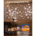 thumbnail image 4 of Proyector navideño con forma de copo de nieve, arte con luces en exteriores reales, 4 of 7