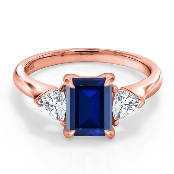 Gem Stone King 18K Rose Gold Plated Silver Blue Created Sapphire and Moissanite 3-Stone Ring for Women (1.82 Cttw, 8X6MM Octagon, 3.5 Trillion, Gemstone Birthstone, Size 5, 6, 7, 8, 9)