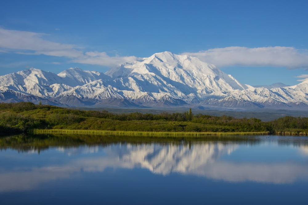 Scenic view of Mt McKinley reflecting in Reflection Pond Denali ...