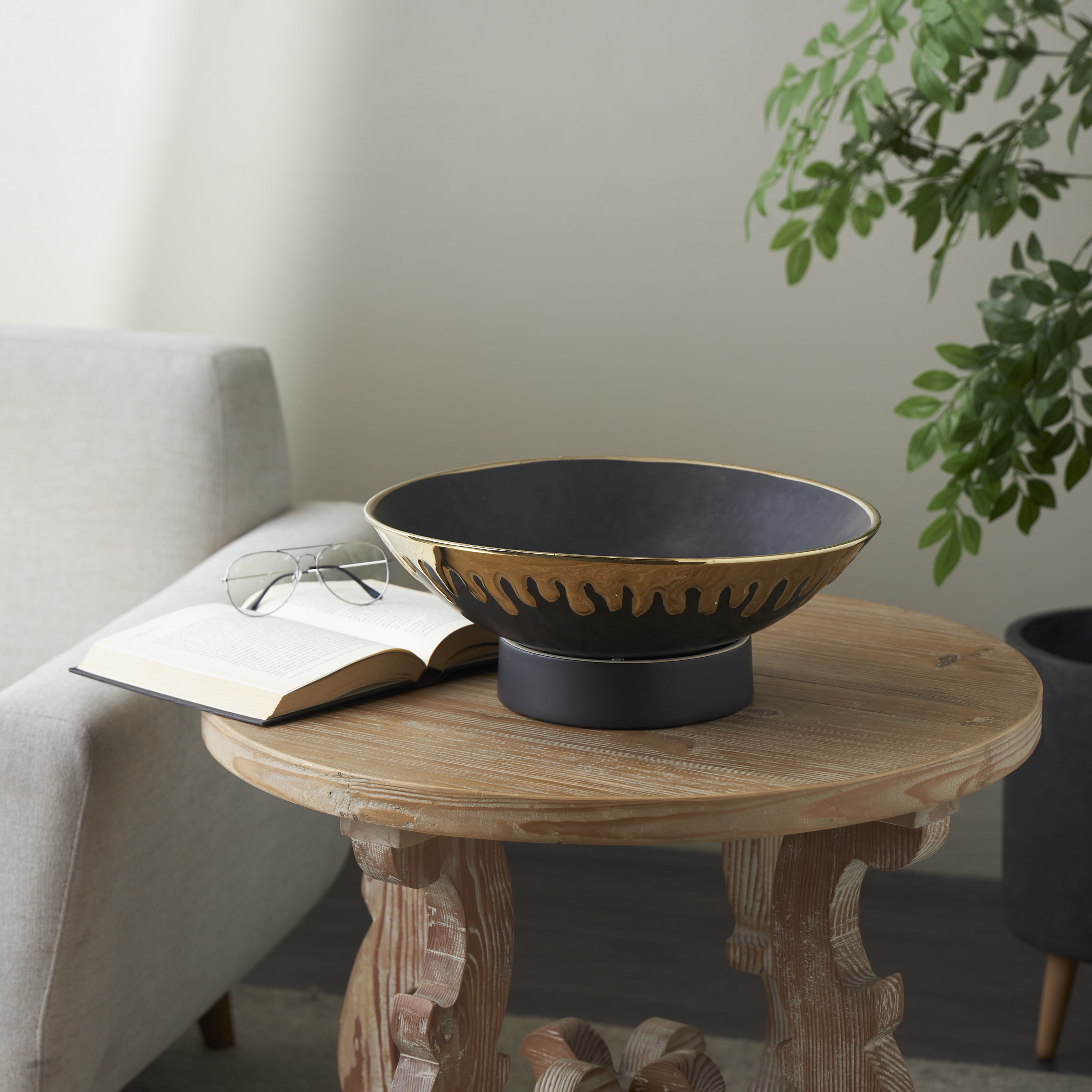 CosmoLiving by Cosmopolitan 15" Round Black Ceramic Decorative Bowl with Abstract Gold Melting Drips