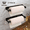 Style 1: 2pcs Black, variant on Under Cabinet Toilet Paper Towel Holder, Heavy Duty Stainless Steel Wall Mount Rack, Fits Jumbo Rolls, Adhesive or Screw Installation, Black