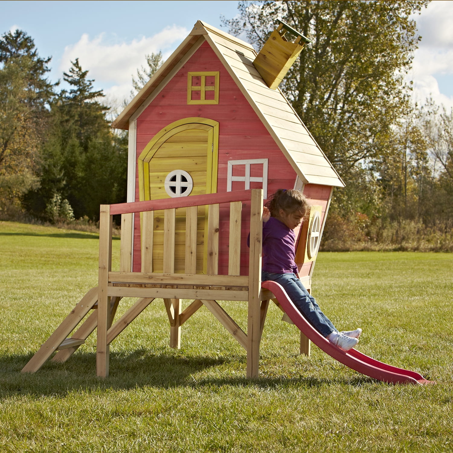 wooden playhouse with slide and swing