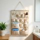 thumbnail image 4 of Organizador de pared con múltiples bolsillos | Soporte de pared con cuerda resistente y varilla de madera, 4 of 8