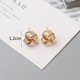 thumbnail image 1 of Pendientes pequeños de Metal para mujer, aretes redondos retorcidos de Color dorado, pequeños e inusuales, joyería de moda, 1 of 4