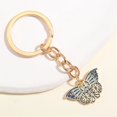 thumbnail image 1 of LLavero de mariposa hueca de diamantes de imitación para mujer, llaveros de cristal chapados en oro, llaveros de insectos, regalos de fiesta, joyería de moda, 1 of 4