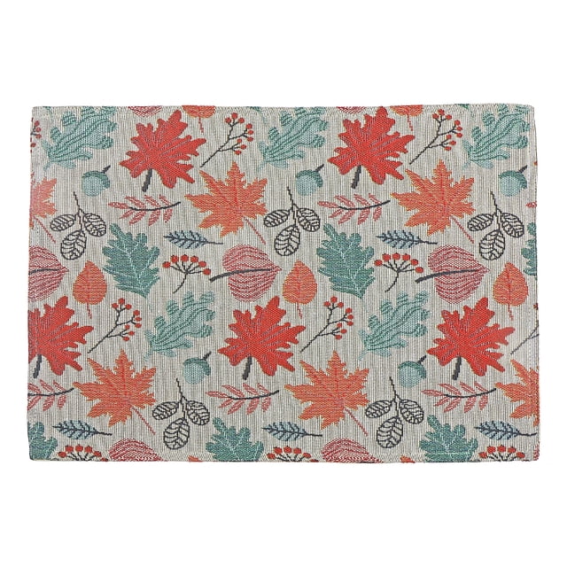Tapestry placemat featuring an autumn-themed design with red, orange, and green leaves scattered on a beige woven fabric.