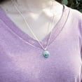 thumbnail image 2 of Sea Otter Eating Giant Clam 0.75" Pendant with Sterling Silver Plated Chain, 2 of 3