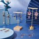 thumbnail image 5 of Kit para hacer 10 pares de aretes de estrella y luna, esmaltados, planos, redondos, con forma de corazón, anillos de unión y accesorios para aretes., 5 of 9