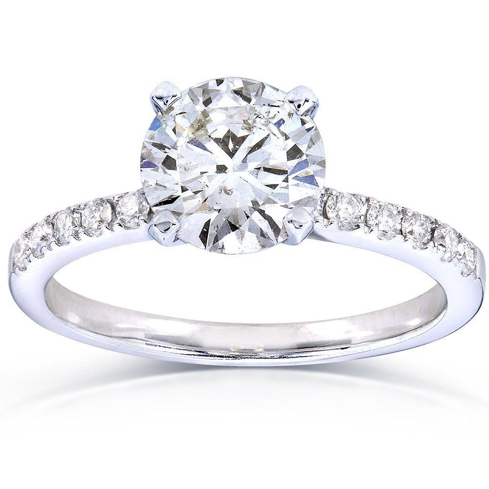 Презентация кольца с бриллиантом круглой огранки в белом золоте