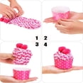 thumbnail image 3 of pares de calcetines de felpa esponjosos en embalaje para cupcakes, 3 of 5