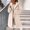 Beige, variant on Womens Fuzzy Fleece Long Coat Winter Warm Zip Up Faux Shearling Outerwear Overcoat with Pockets Trendy Thick Fluffy Fall Fashion Teddy Jacket