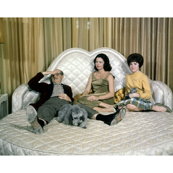 Groucho Marx poses on his bed with wife Eden Hartford 8x10 inch photo