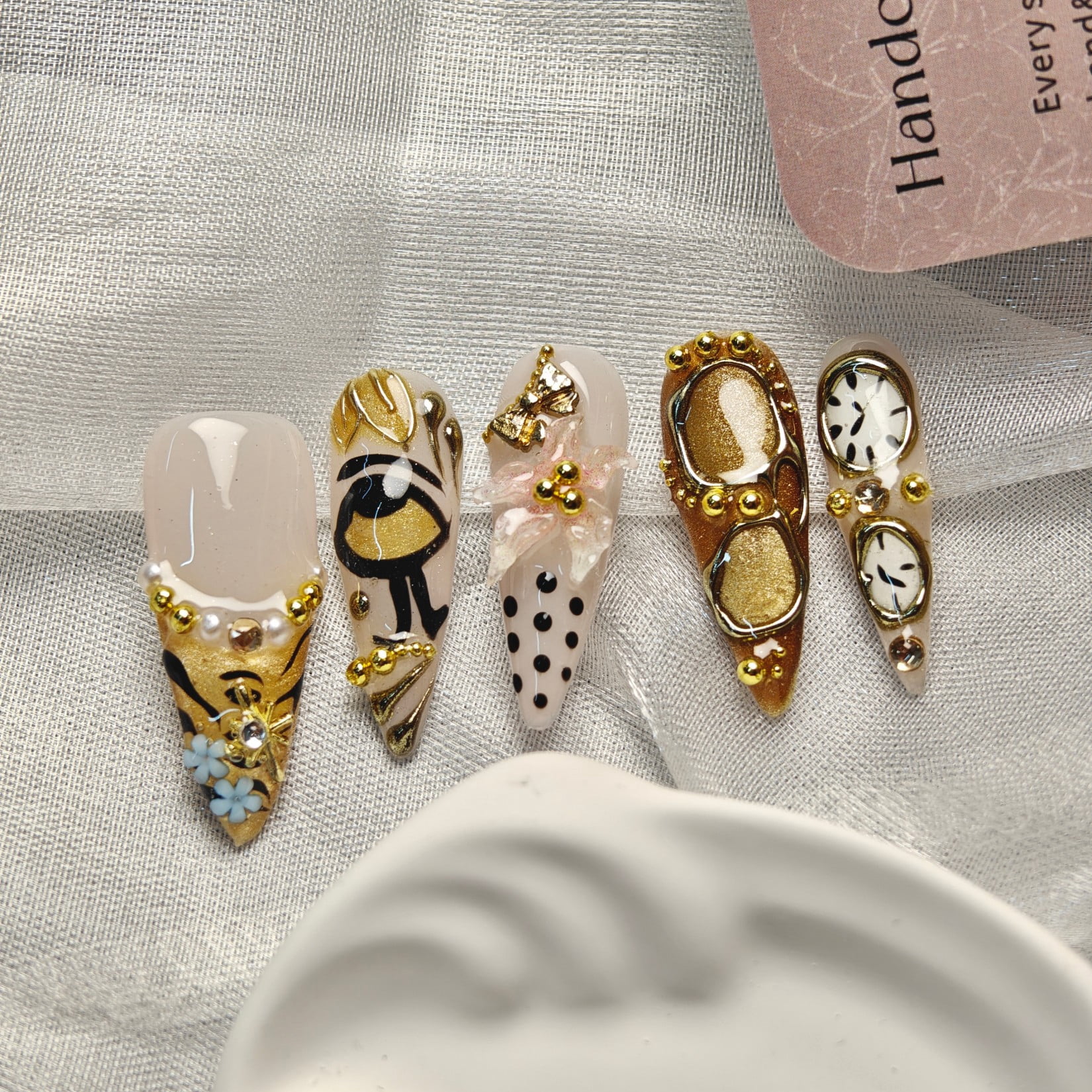 Handmade Press-on Nails with Gold Accents and 3D Artistic Design
