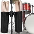 thumbnail image 2 of Bolsa porta baquetas doble en tela Oxford, práctica y resistente, ideal para bateristas, color negro, con gancho ajustable para fijación en soporte de batería, capacidad para hasta 8 pares de, 2 of 6