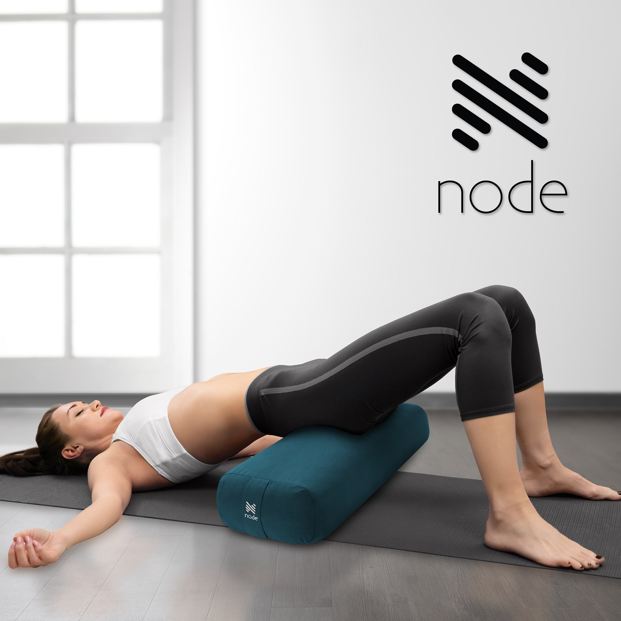Enhance your yoga and meditation practice with the Node Fitness Yoga Meditation Cushion. Measuring at 25 x 12, this rectangular bolster is designed to provide comfort and support during your sessions. The calming teal color adds a touch of tranquility to your practice space, while the organic cotton cover ensures a sustainable and eco-friendly choice.