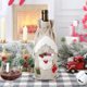 thumbnail image 4 of 3 piezas de soporte de botella de vino de arpillera de Navidad bolsa de botella de vino tinto de champán bolsa de vino de alce de muñeco de nieve de Papá Noel, 4 of 5