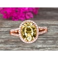 thumbnail image 1 of 8x6mm Oval Cut 10k Rose Gold Champagne Diamond Moissanite Halo Engagement Ring With 2.25 Carat Split Shank, 1 of 5