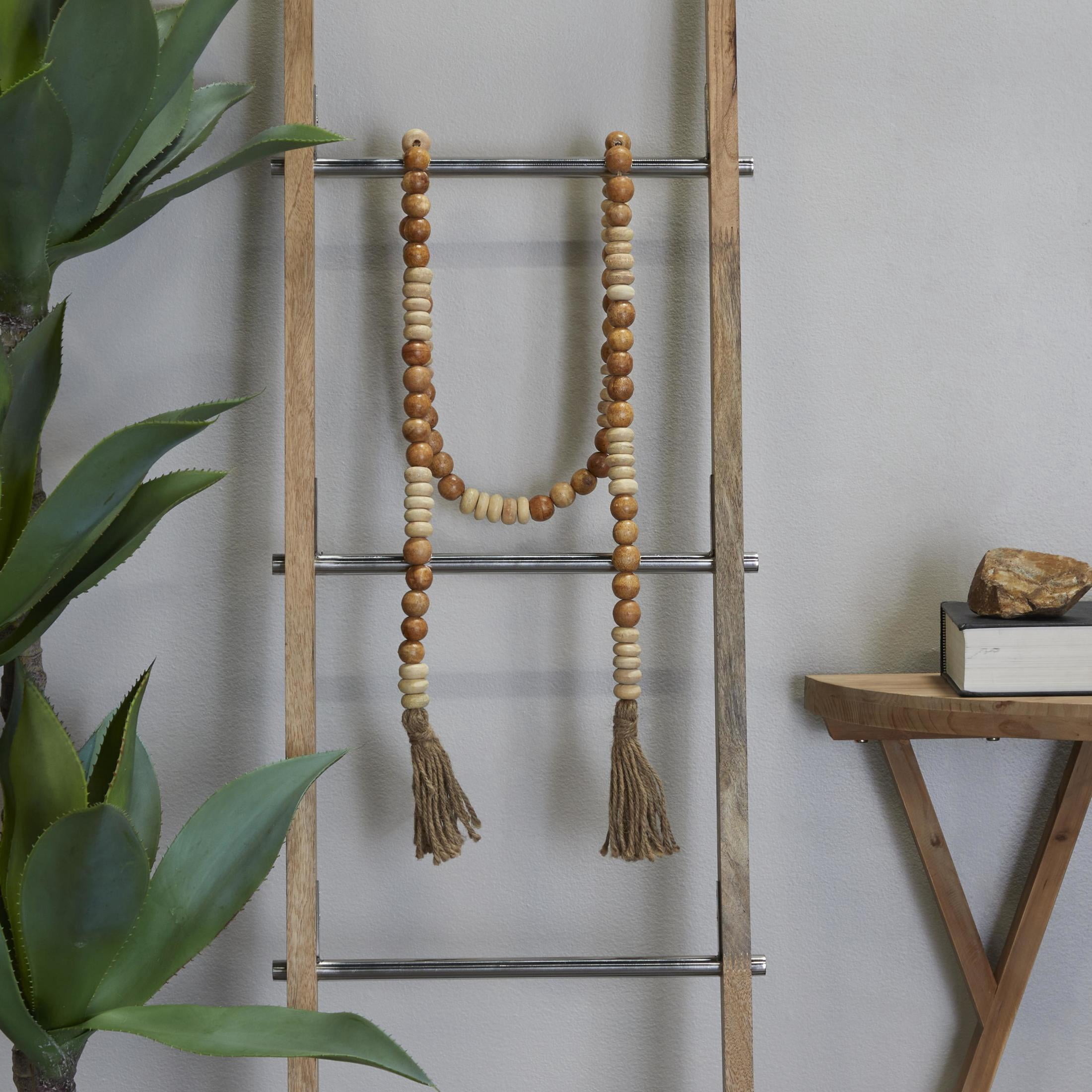 DecMode Handmade Round Long Carved Brown Mango Wood Garland with Tassel