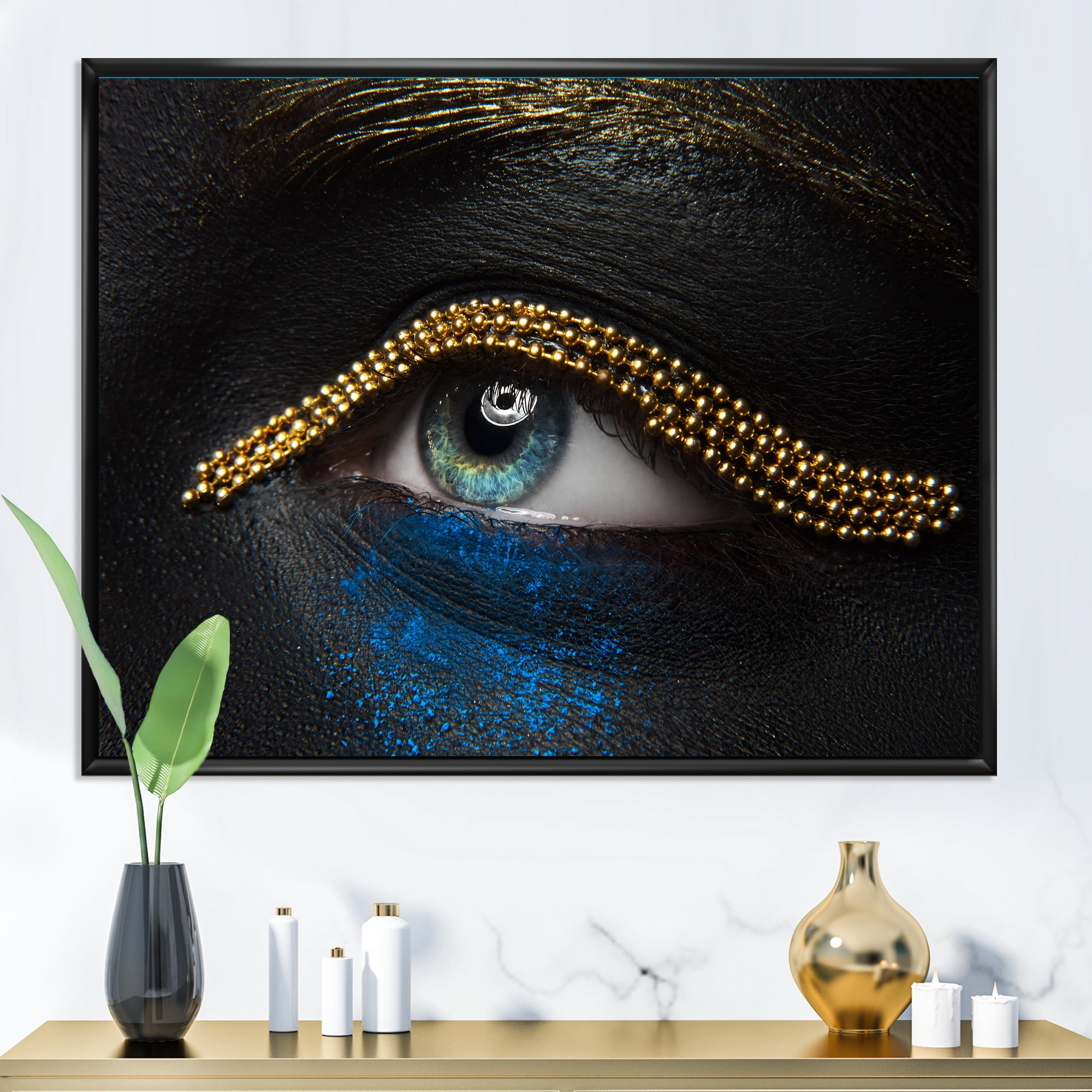Designart 'Woman Eyes With Black Skin With A Gold Chain' Modern Framed Canvas Wall Art Print
