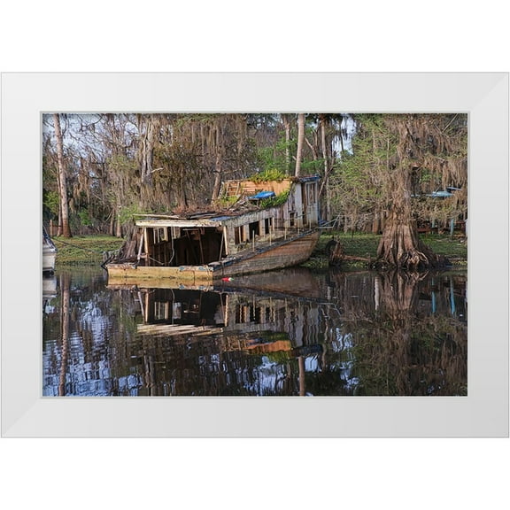 Jones, Adam 14x11 White Modern Wood Framed Museum Art Print Titled - Early spring view of old abandoned boat-blackwater area of St Johns River-central Florida