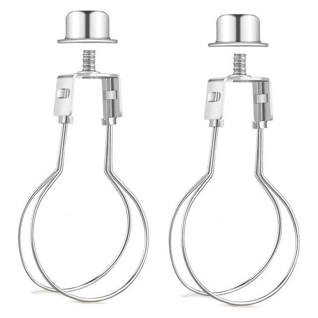 2 Pack Round Lamp Shade Light Bulb Clip Adapter ALUCSET Holder Clips J7V7, crafted from durable silver metal with a round wire frame and prongs for secure lampshade attachment. Includes threaded tops compatible with standard lamp finials, perfect for small to medium-sized shades in home, bedroom, or office lighting setups. A practical lighting accessory for easy lamp shade installation.